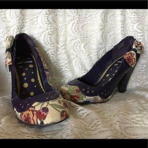 Cute retro “not rated” purple flowery bowed heels.